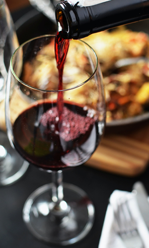 wine being poured into glass